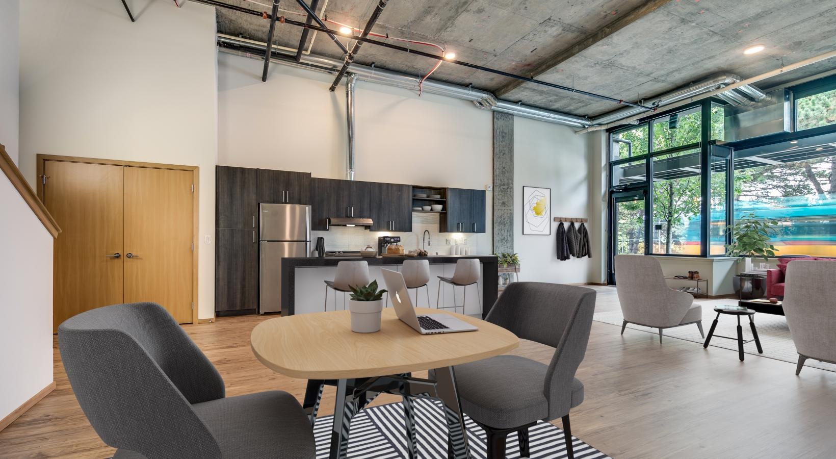 Wide open living areas perfect for entertaining a room with a table and chairs