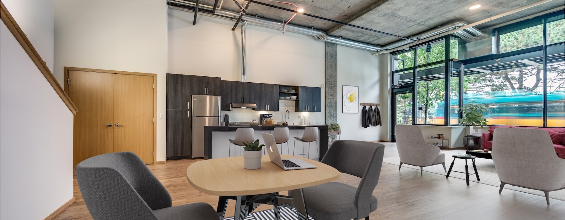 a room with a table and chairs