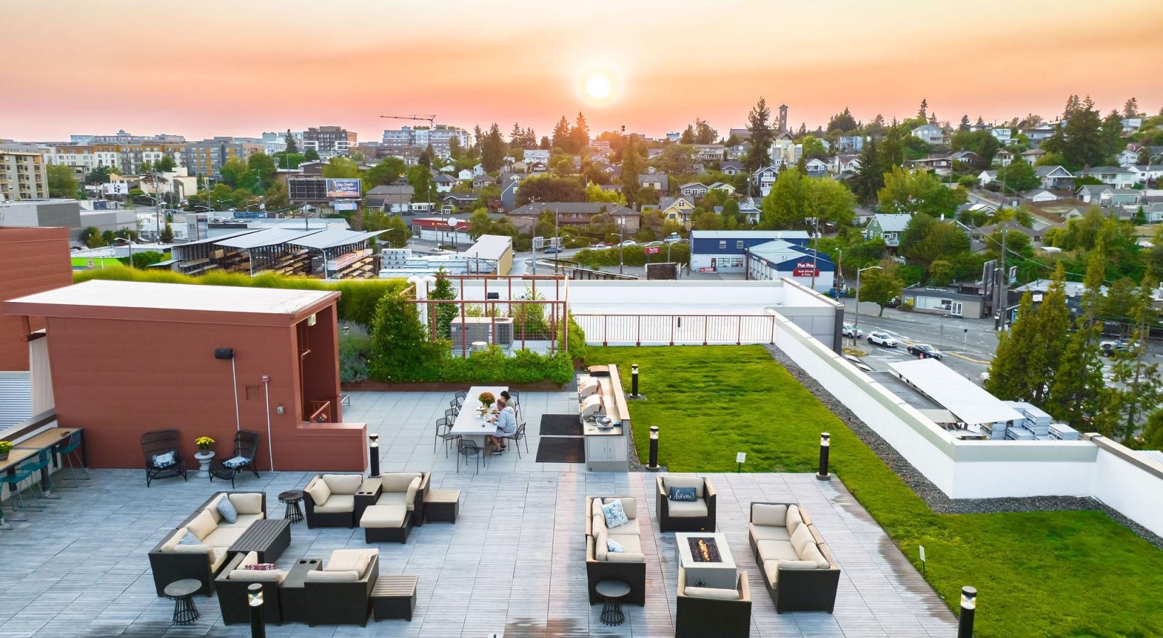 State-of-the-art amenities a courtyard with couches, chairs and tables