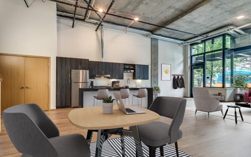 a room with a table and chairs
