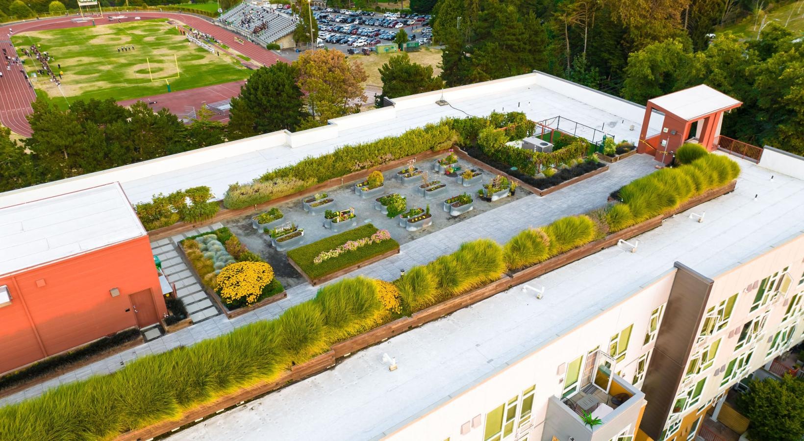 Settle into comfort at Forge West Seattle a building with a lawn and trees